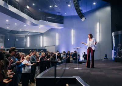 Dr. Fambro prays over TKU students during Chapel at The King's