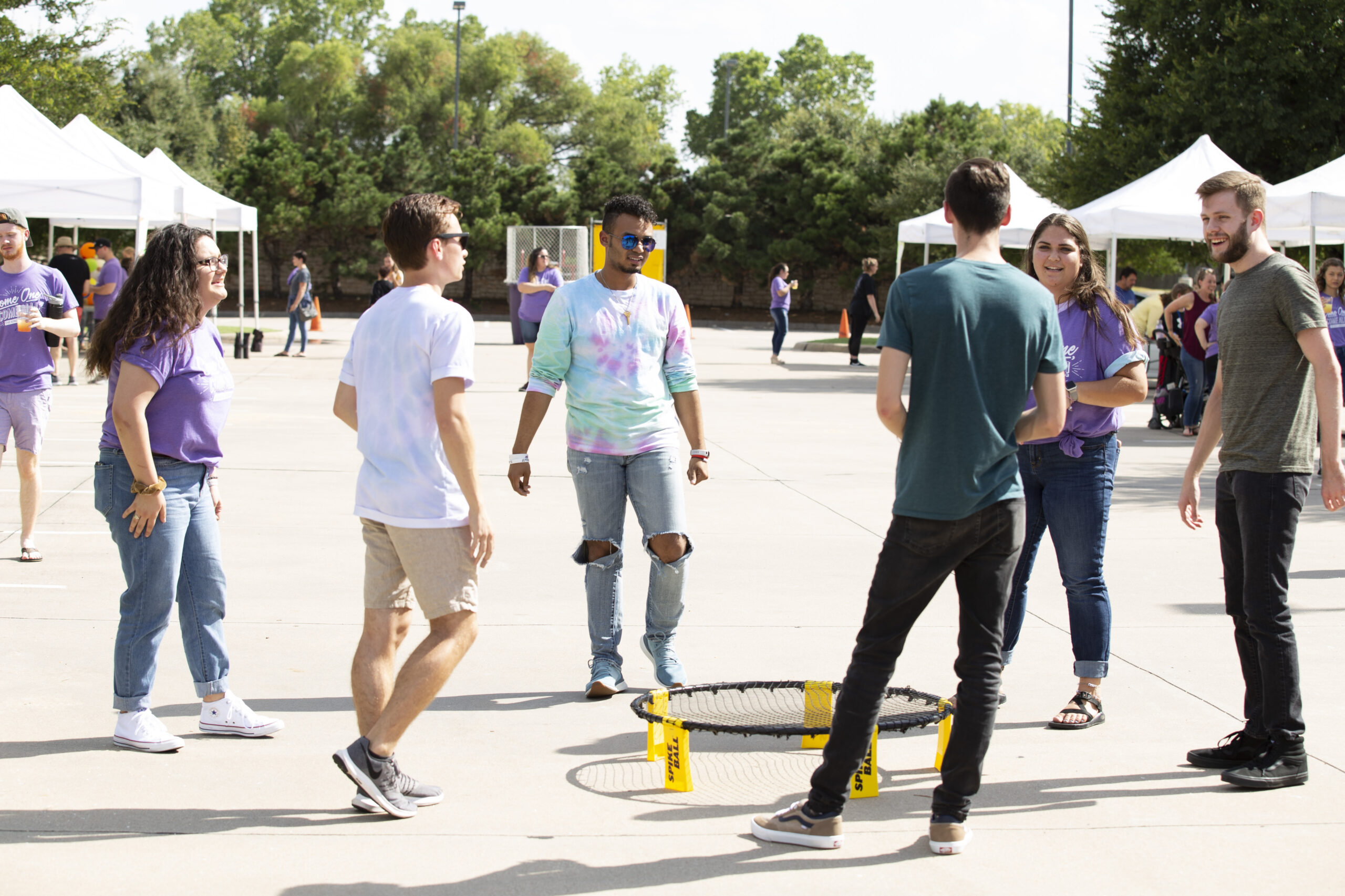 Students play carnival-style games outdoors at TKU Carnival.